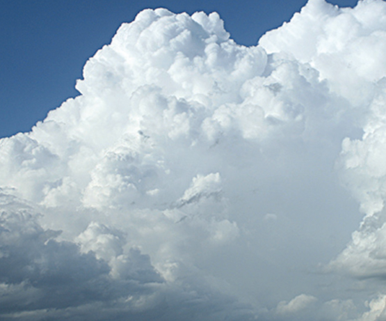 Cumulonimbus: Very tall summits, which lack sharp outlines and are not anvil-shaped